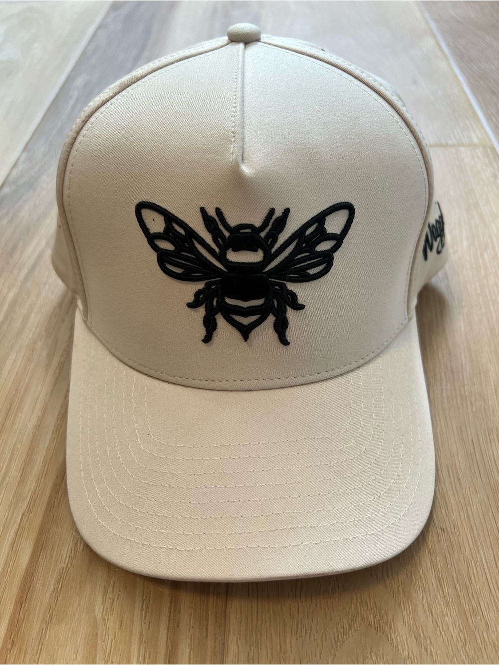 Waggle Buzzin' Golf Hat Cream Cap with Black Logo